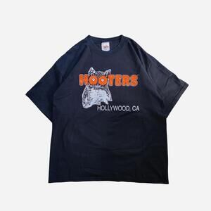 Hooters T-Shirt with Black tee with orange and white owl graphic and 'HOOTERS' a